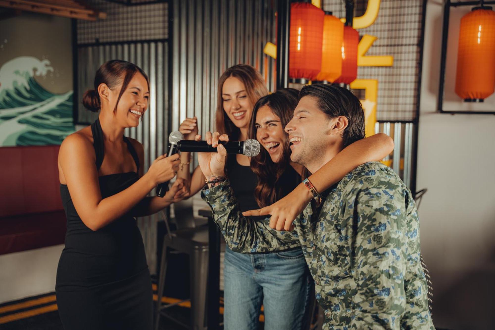 Five Jumeirah Village Дубай Экстерьер фото Friends having fun at a party